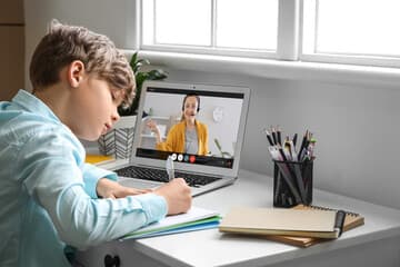 Online tutoring - tutor and student in a learning session